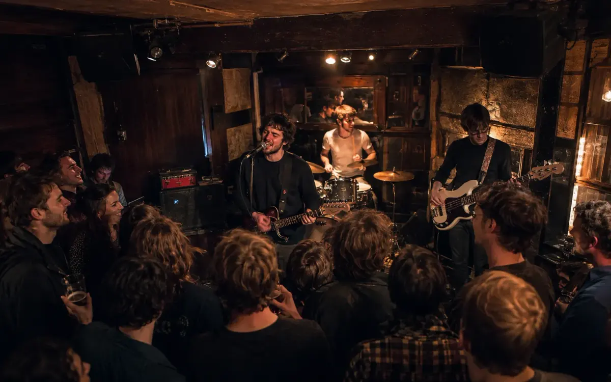A band playing a packed, wood-panelled venue, the young crowd pressed close to the stage.